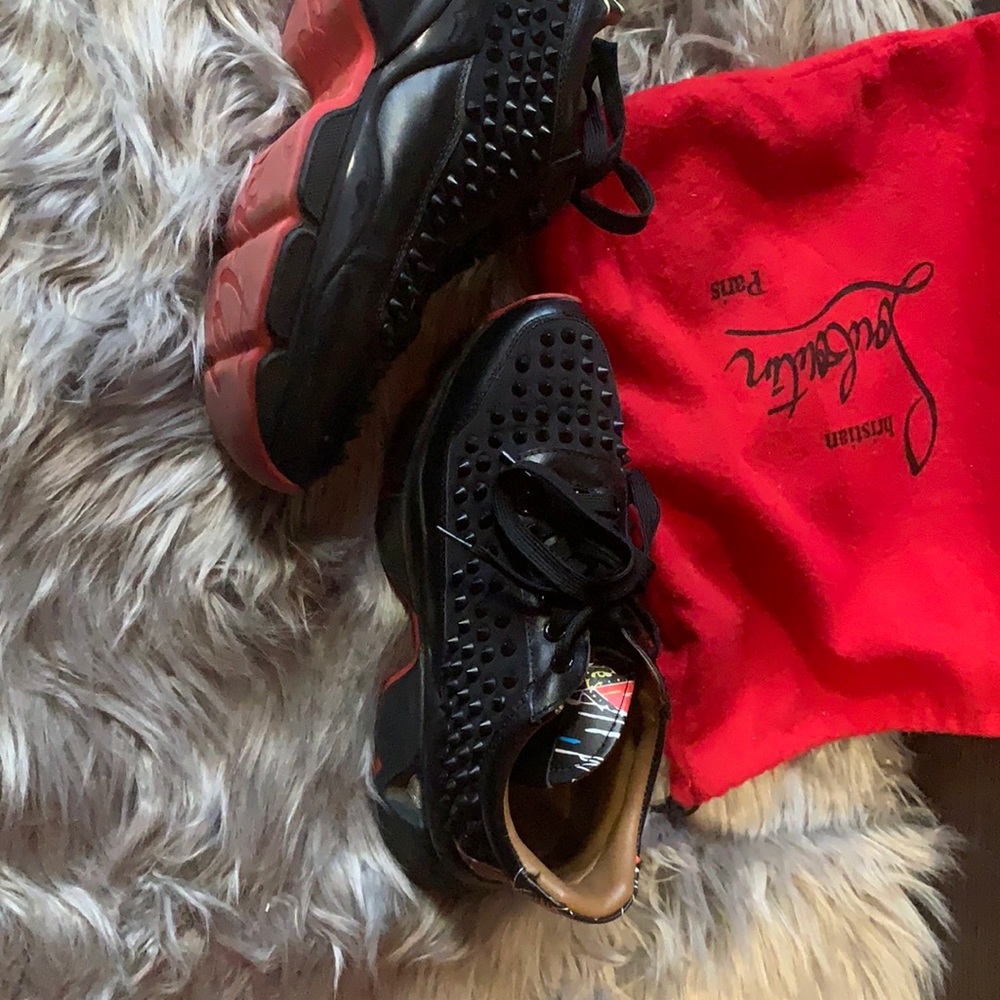 Louboutin spiked black sneakers